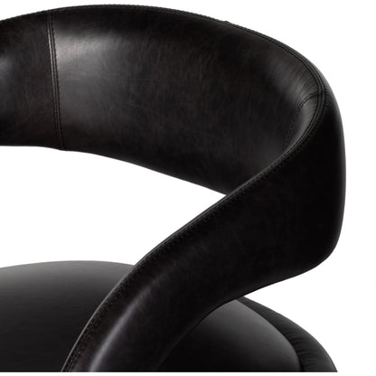 Hawkins Swivel Chair by Four Hands in sonoma butterscotch. Made from top grain leather, poplar plywood, 100% polyester in a modern style.