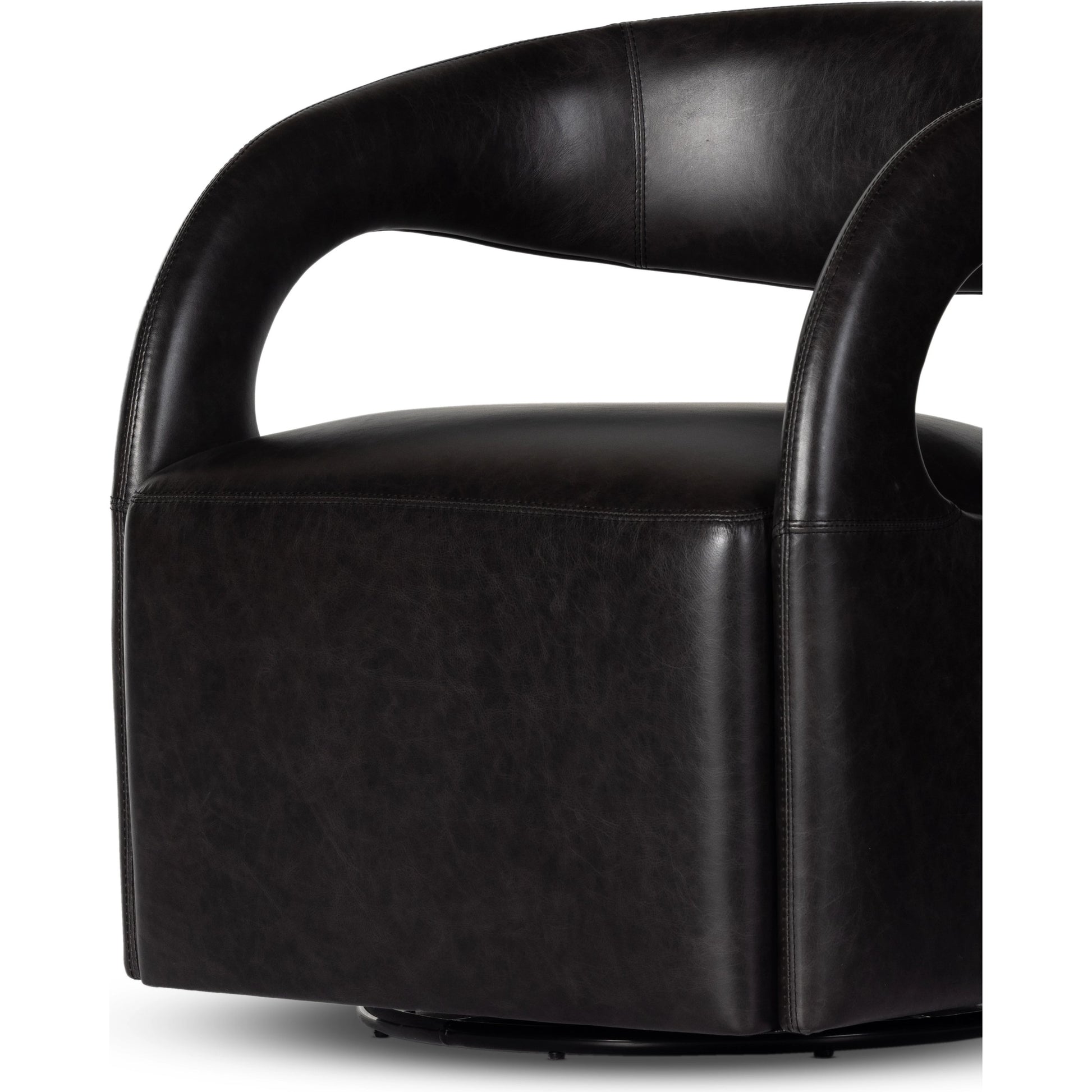 Hawkins Swivel Chair by Four Hands in sonoma butterscotch. Made from top grain leather, poplar plywood, 100% polyester in a modern style.