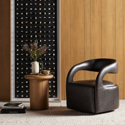 Hawkins Swivel Chair by Four Hands in sonoma butterscotch. Made from top grain leather, poplar plywood, 100% polyester in a modern style.