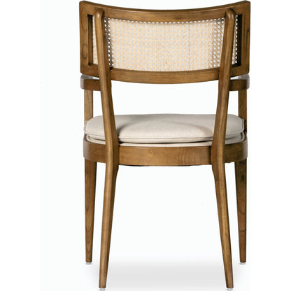 Britt Dining Armchair by Four Hands. Made from 92% polyester, 8% flax, linen, solid nettlewood, cane in a modern style.