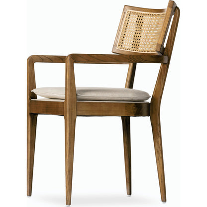 Britt Dining Armchair by Four Hands. Made from 92% polyester, 8% flax, linen, solid nettlewood, cane in a modern style.