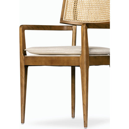 Britt Dining Armchair by Four Hands. Made from 92% polyester, 8% flax, linen, solid nettlewood, cane in a modern style.