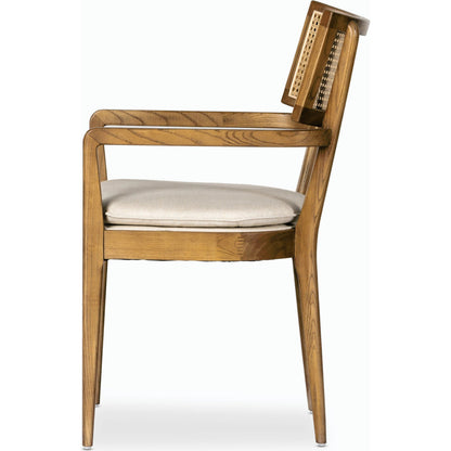 Britt Dining Armchair by Four Hands. Made from 92% polyester, 8% flax, linen, solid nettlewood, cane in a modern style.