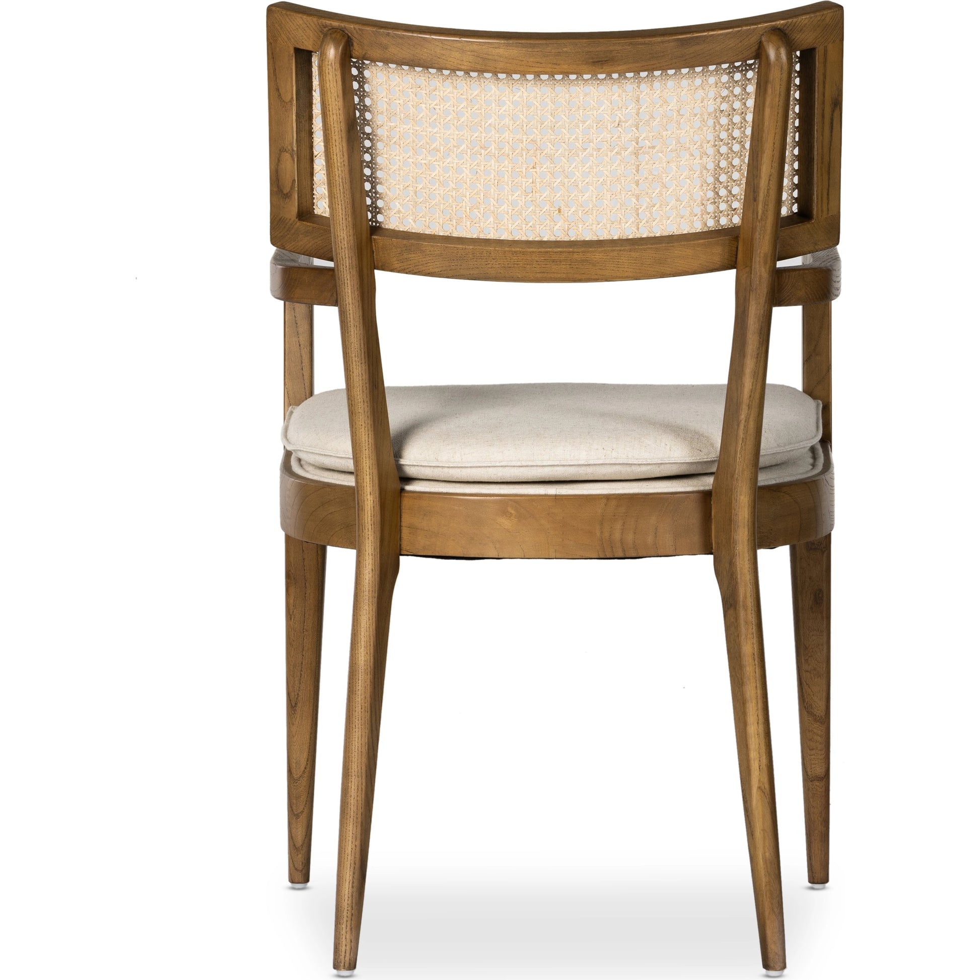 Britt Dining Armchair by Four Hands. Made from 92% polyester, 8% flax, linen, solid nettlewood, cane in a modern style.