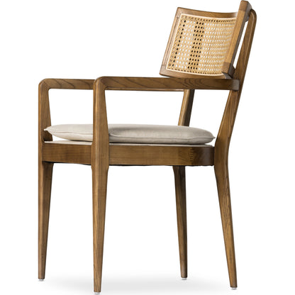 Britt Dining Armchair by Four Hands. Made from 92% polyester, 8% flax, linen, solid nettlewood, cane in a modern style.