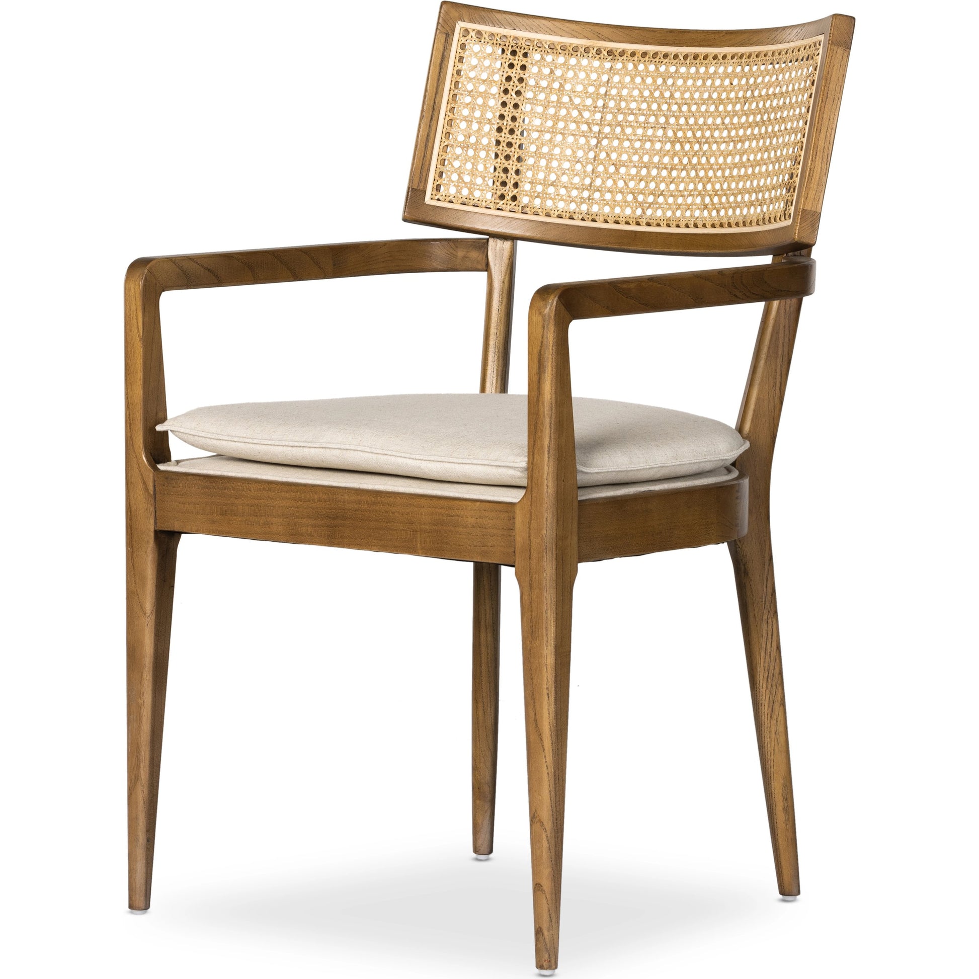 Britt Dining Armchair by Four Hands. Made from 92% polyester, 8% flax, linen, solid nettlewood, cane in a modern style.