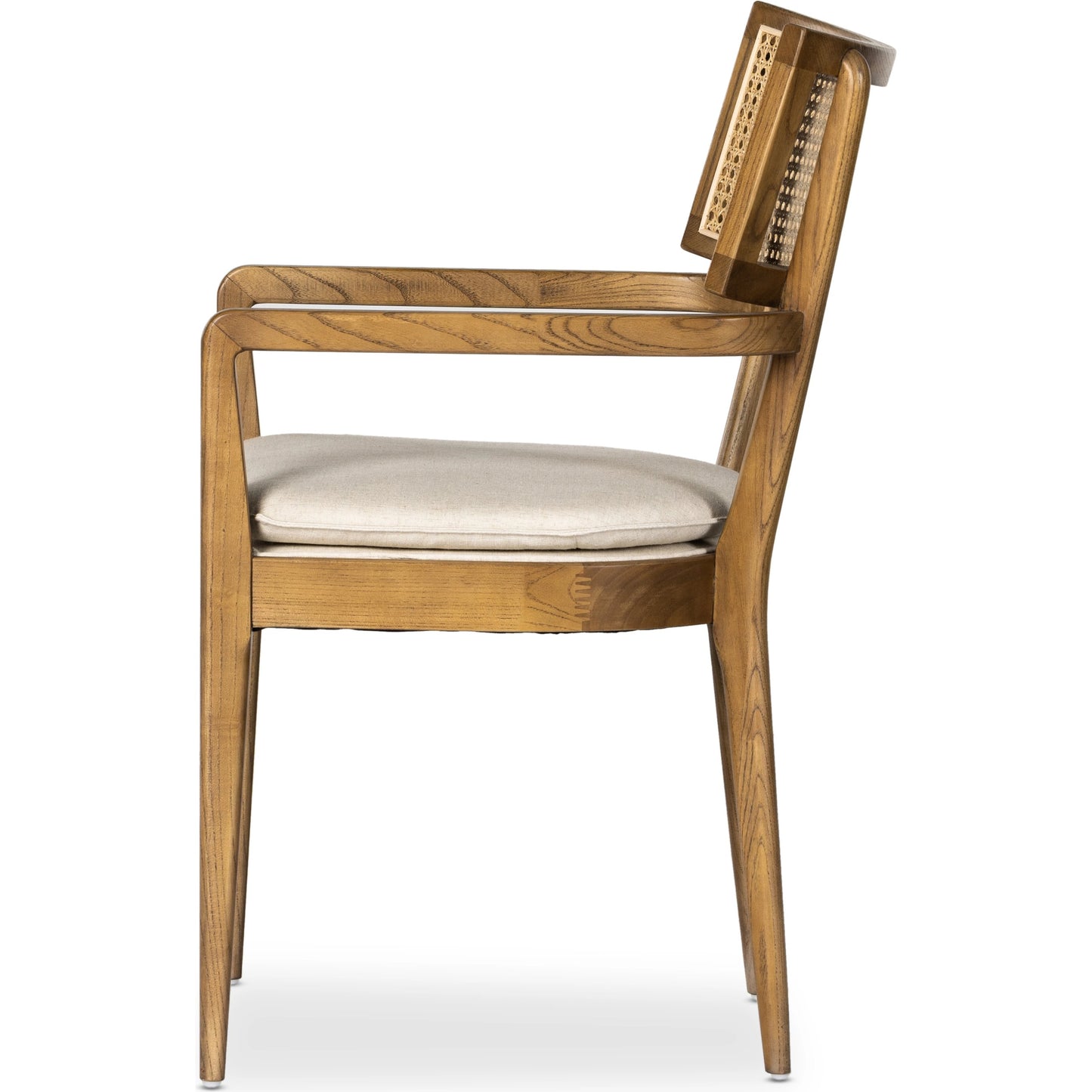 017 SI-1980147 | Additional Silo | Britt Dining Armchair by Four Hands in natural cane, toasted nettlewood, savile flax. Made from 92% polyester, 8% flax, linen, solid nettlewood, cane in a modern style.