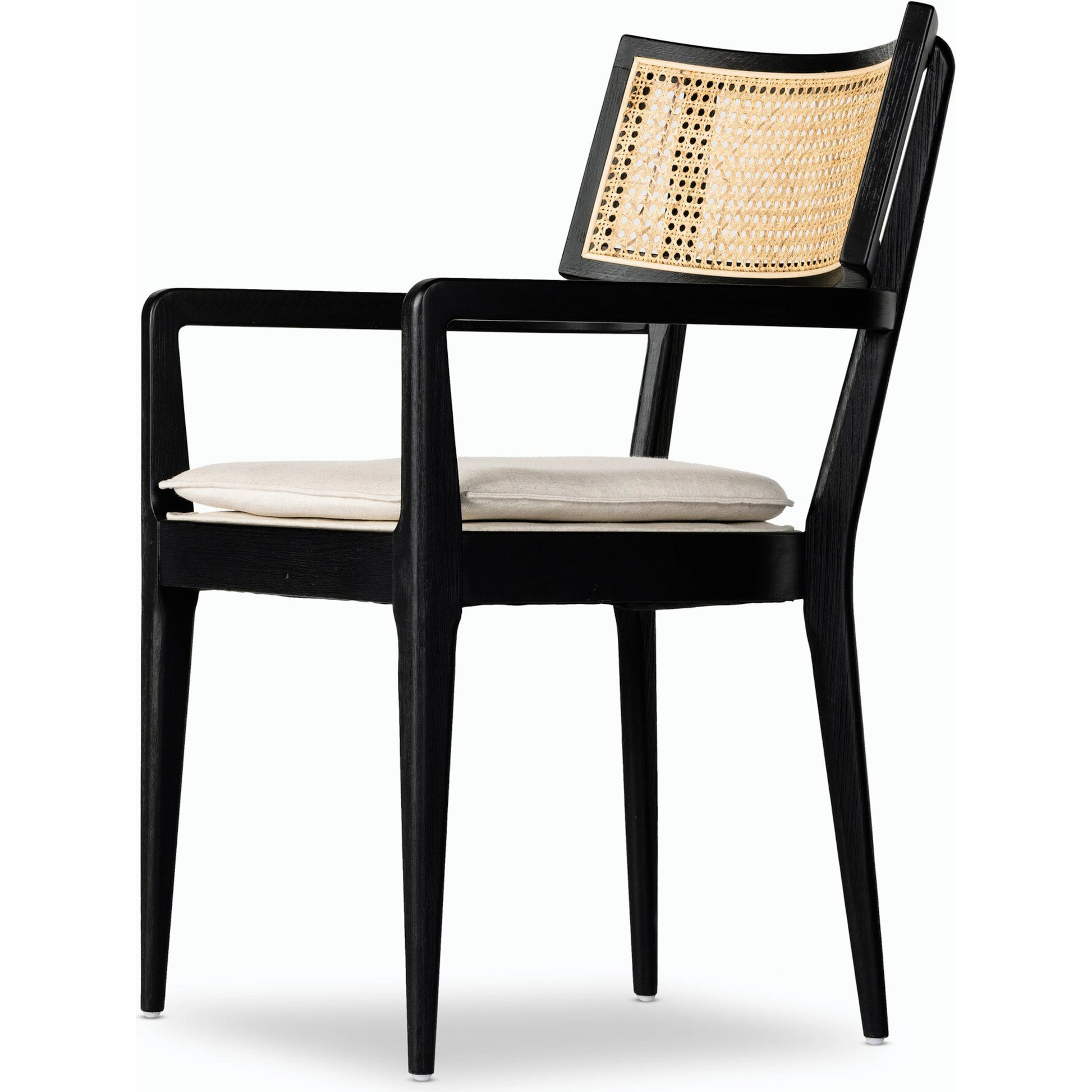 Britt Dining Armchair by Four Hands. Made from 92% polyester, 8% flax, linen, solid nettlewood, cane in a modern style.