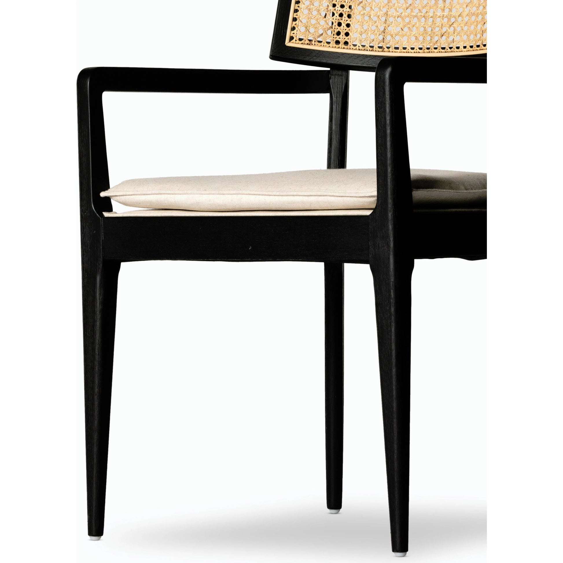 Britt Dining Armchair by Four Hands. Made from 92% polyester, 8% flax, linen, solid nettlewood, cane in a modern style.