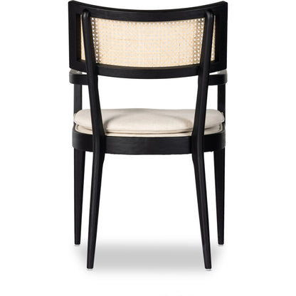 Britt Dining Armchair by Four Hands. Made from 92% polyester, 8% flax, linen, solid nettlewood, cane in a modern style.