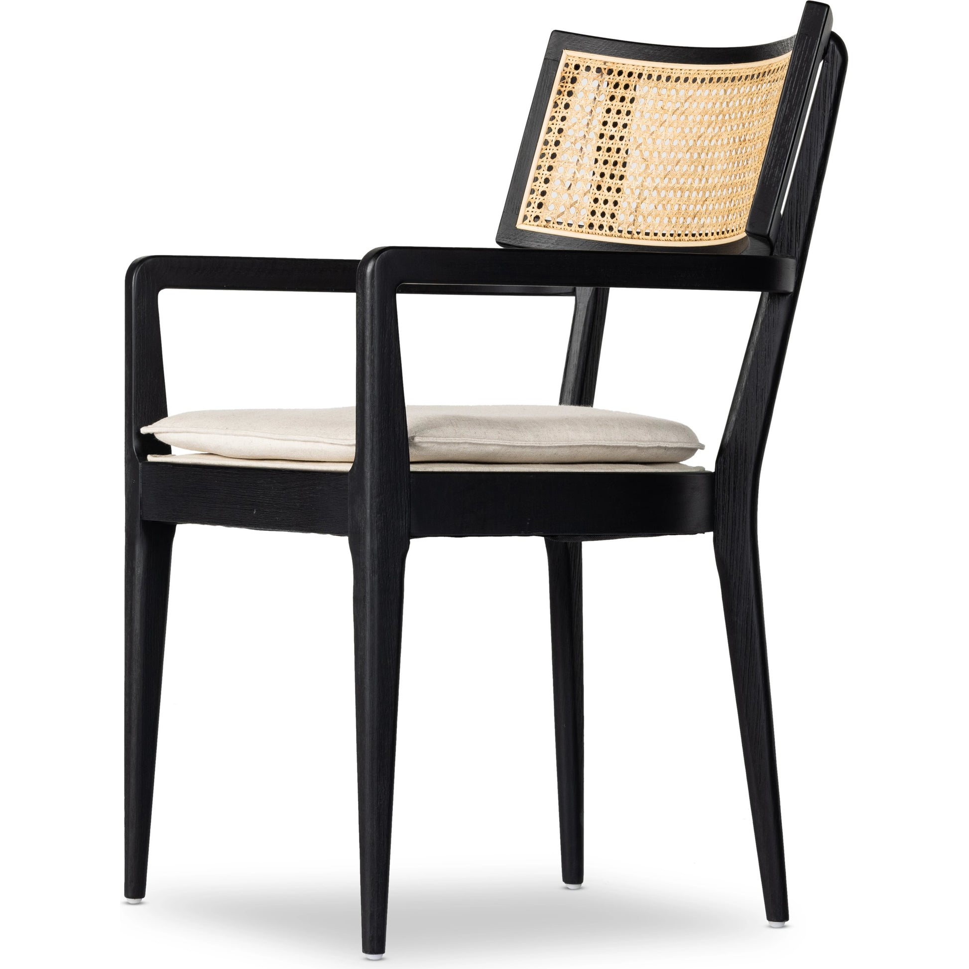 Britt Dining Armchair by Four Hands. Made from 92% polyester, 8% flax, linen, solid nettlewood, cane in a modern style.