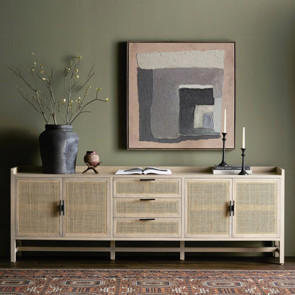 Caprice 96" Sideboard by Four Hands in natural mango. Made from solid mango, iron, cane in a modern style.