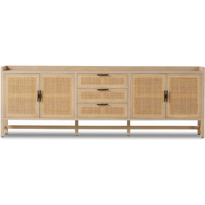 Caprice 96" Sideboard by Four Hands in natural mango. Made from solid mango, iron, cane in a modern style.