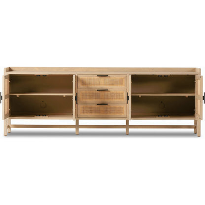 Caprice 96" Sideboard by Four Hands in natural mango. Made from solid mango, iron, cane in a modern style.