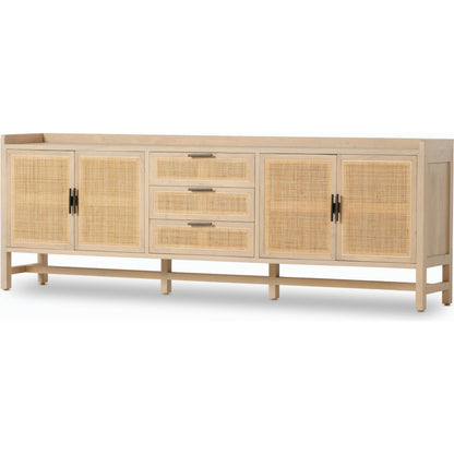 Caprice 96" Sideboard by Four Hands in natural mango. Made from solid mango, iron, cane in a modern style.