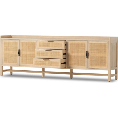 Caprice 96" Sideboard by Four Hands in natural mango. Made from solid mango, iron, cane in a modern style.