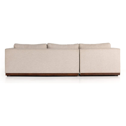 Lawrence 2-Piece Sectional with Chaise by Four Hands in nova taupe. Made from 100% polyester, solid rosa morada, solid pine in a modern style.
