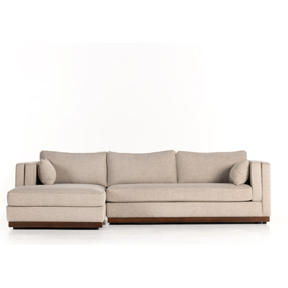 Lawrence 2-Piece Sectional with Chaise by Four Hands in nova taupe. Made from 100% polyester, solid rosa morada, solid pine in a modern style.