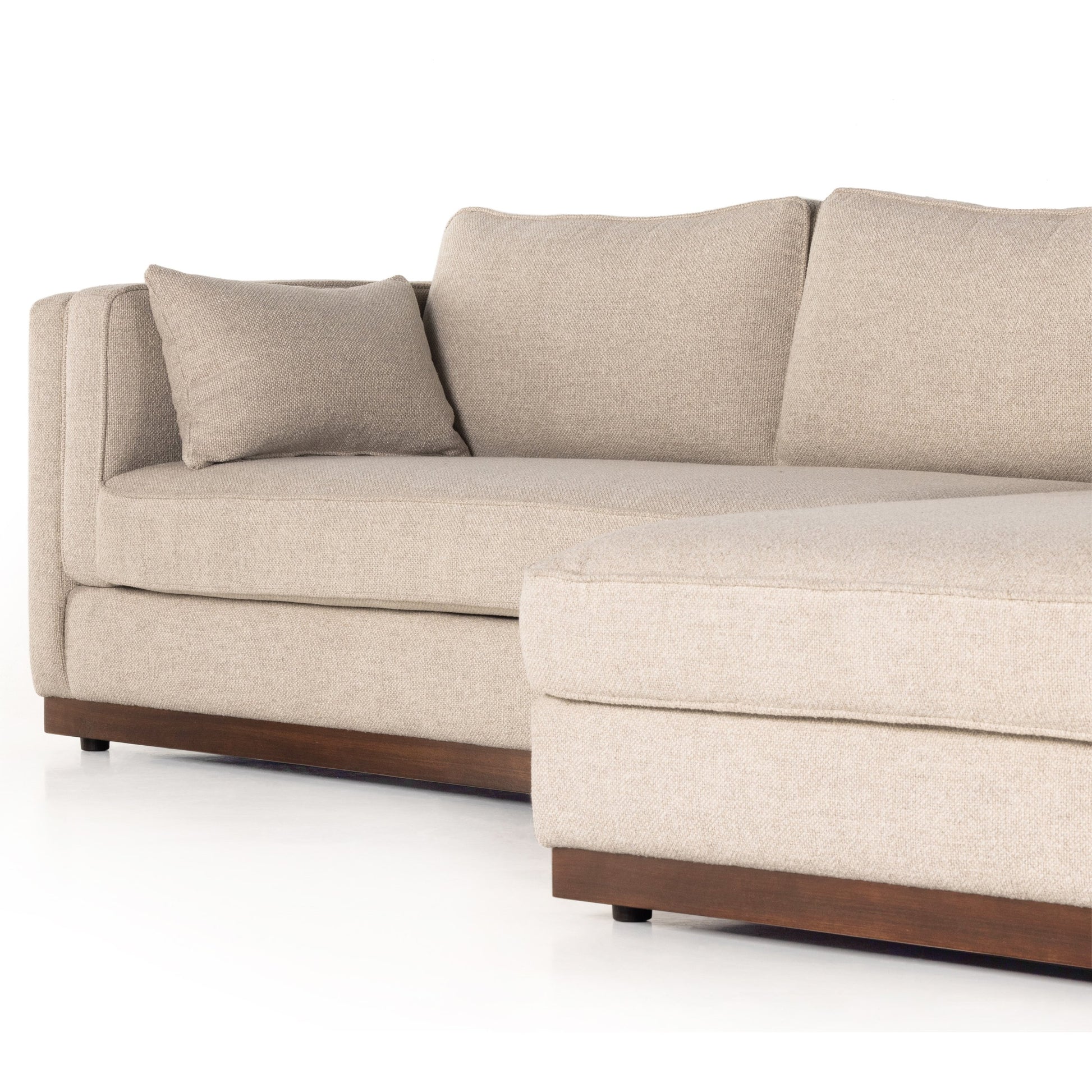 Lawrence 2-Piece Sectional with Chaise by Four Hands in nova taupe. Made from 100% polyester, solid rosa morada, solid pine in a modern style.