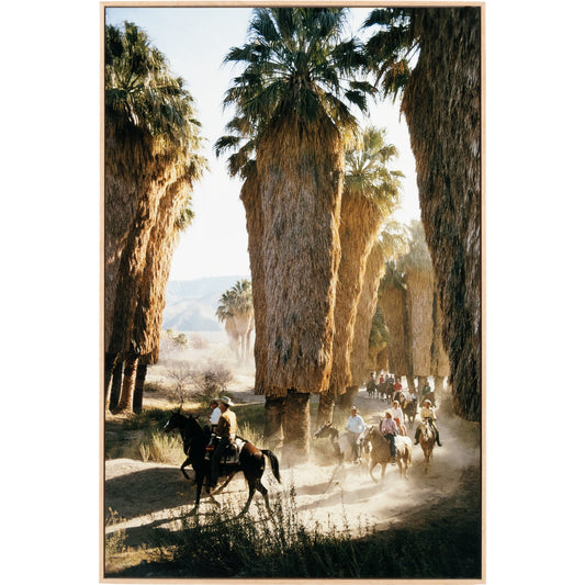 Palm Springs Riders by Slim Aarons by Four Hands. Made from gloss white chromaluxe in a transitional style.