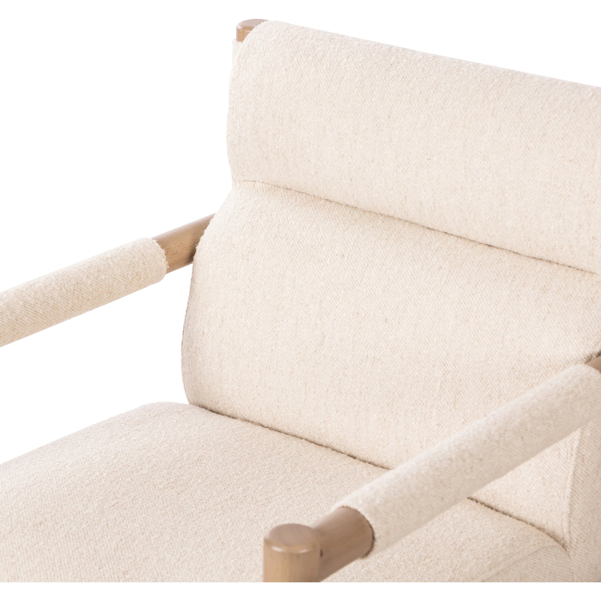 Kiano Dining Armchair by Four Hands in charter oatmeal and washed natural parawood. Made from 69% polyester, 23% acrylic, 8% flax, linen, solid parawood, 100% polyester in a modern style.