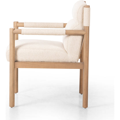 Kiano Dining Armchair by Four Hands in charter oatmeal and washed natural parawood. Made from 69% polyester, 23% acrylic, 8% flax, linen, solid parawood, 100% polyester in a modern style.