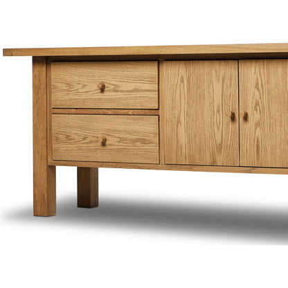 Millbrook Media Console by Four Hands in natural light oak. Made from solid oak, oak veneer in a transitional style.