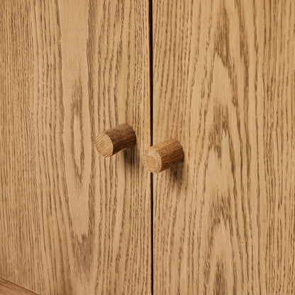 Millbrook Media Console by Four Hands in natural light oak. Made from solid oak, oak veneer in a transitional style.