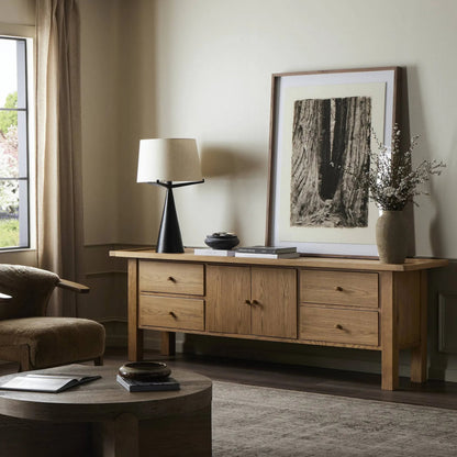 Millbrook Media Console by Four Hands in natural light oak. Made from solid oak, oak veneer in a transitional style.