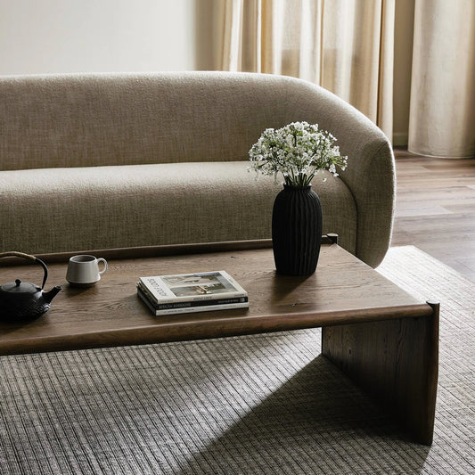 Glenview Coffee Table by Four Hands in weathered oak. Made from solid oak, thick oak veneer, engineered hardwood in a modern style.