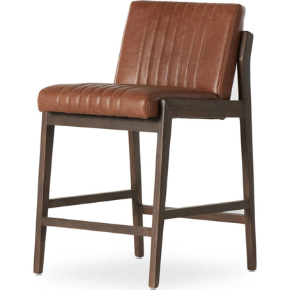 Alice Counter Stool by Four Hands in chestnut. Made from top grain leather, solid beech, 100% polyester in a modern style.