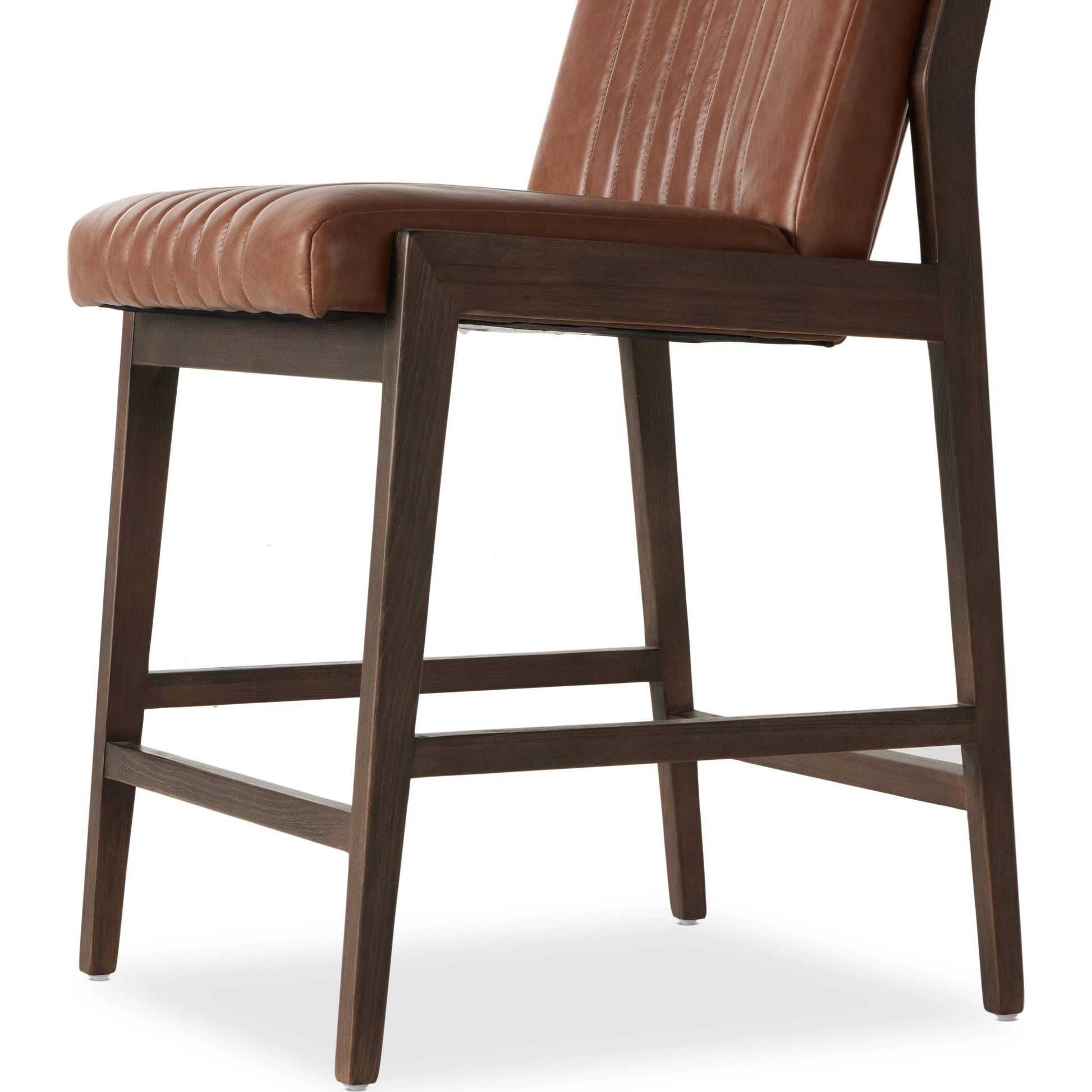 Alice Counter Stool by Four Hands in chestnut. Made from top grain leather, solid beech, 100% polyester in a modern style.