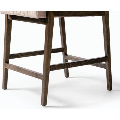 Alice Counter Stool by Four Hands in chestnut. Made from top grain leather, solid beech, 100% polyester in a modern style.