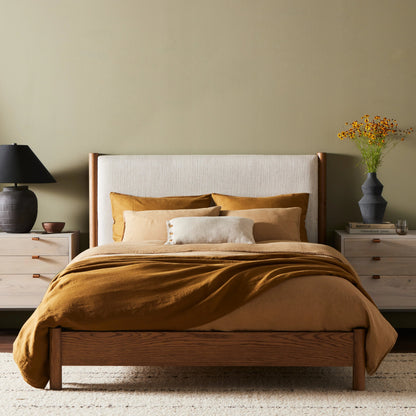 Roark Bed by Four Hands in essence natural and amber oak. Made from 49% viscose (rayon), 22% flax, linen, 18% polyester, 11% cotton, solid oak in a modern style.