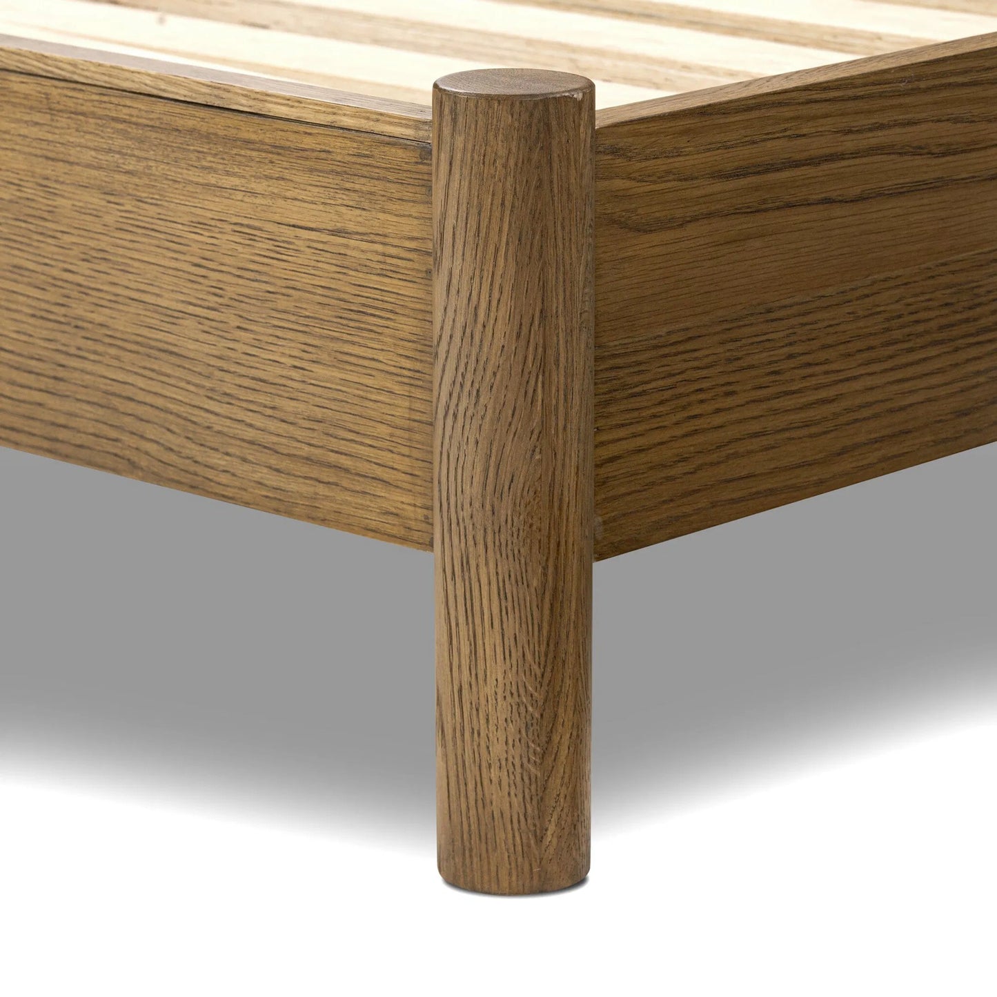 013 SI-2519279 | Closeup | Roark Bed by Four Hands in palermo drift, amber oak, amber oak veneer. Made from top grain leather, solid oak, oak veneer in a traditional style.