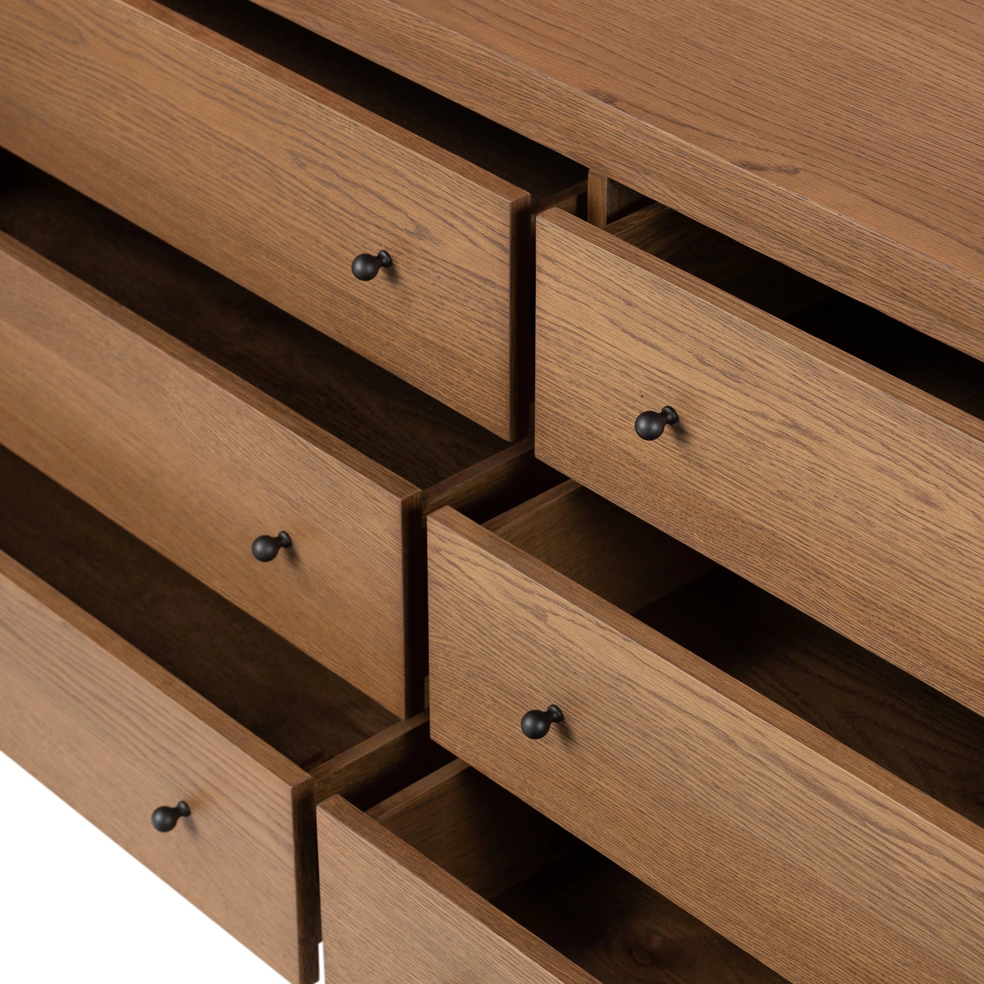 Roark 6 Drawer Dresser by Four Hands in amber oak. Made from oak veneer, solid oak in a modern style.