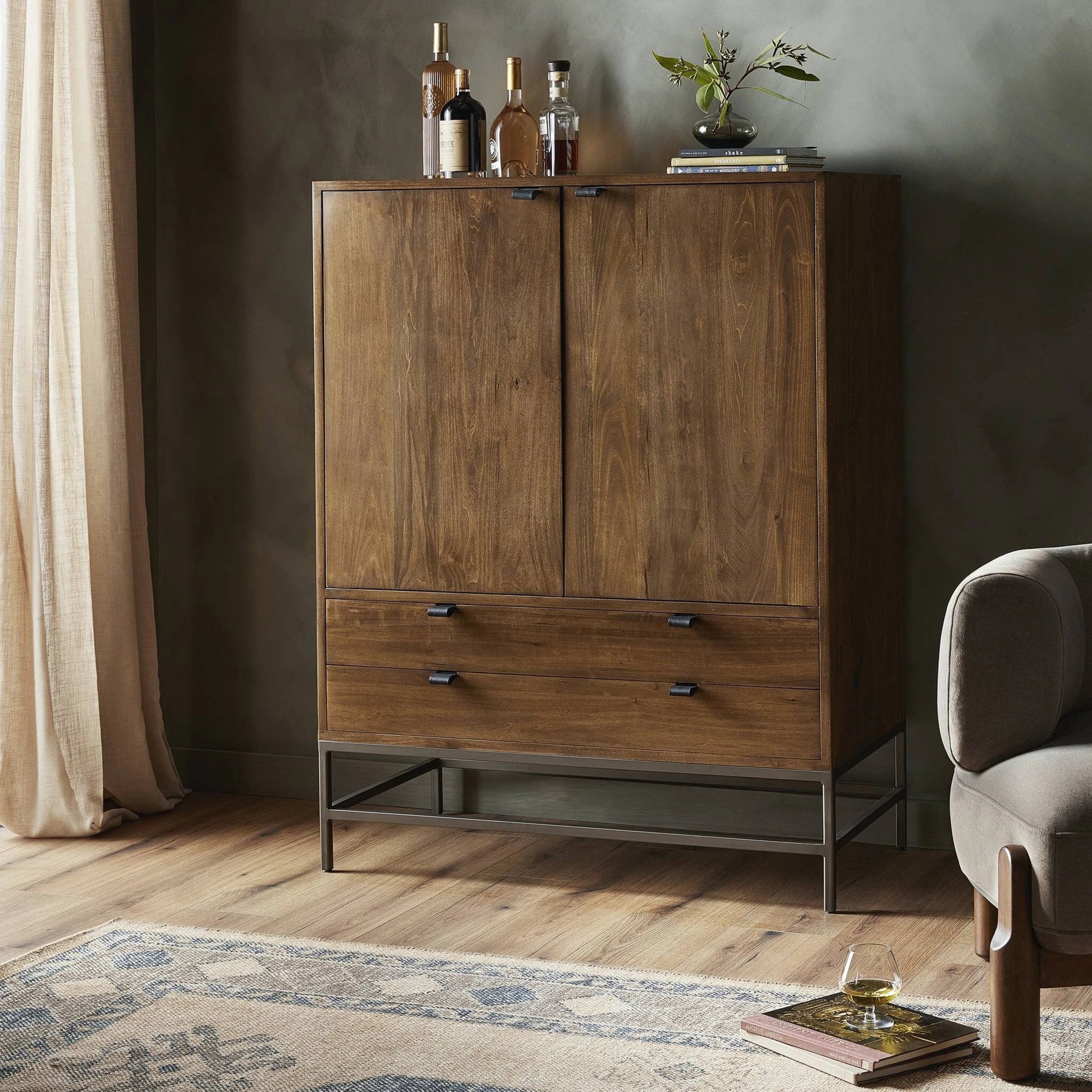 Trey Bar Cabinet by Four Hands in black wash poplar, toffee leather. Made from solid poplar, top grain leather in a modern style.