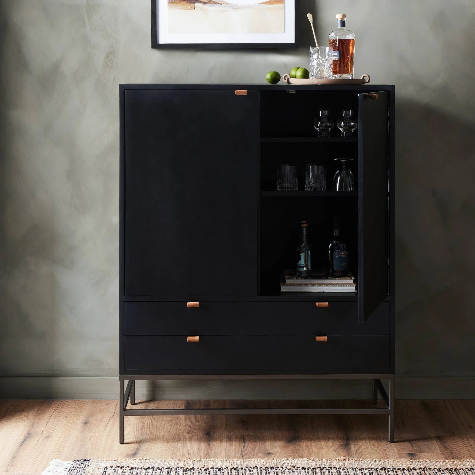 Trey Bar Cabinet by Four Hands in black wash poplar, toffee leather. Made from solid poplar, top grain leather in a modern style.