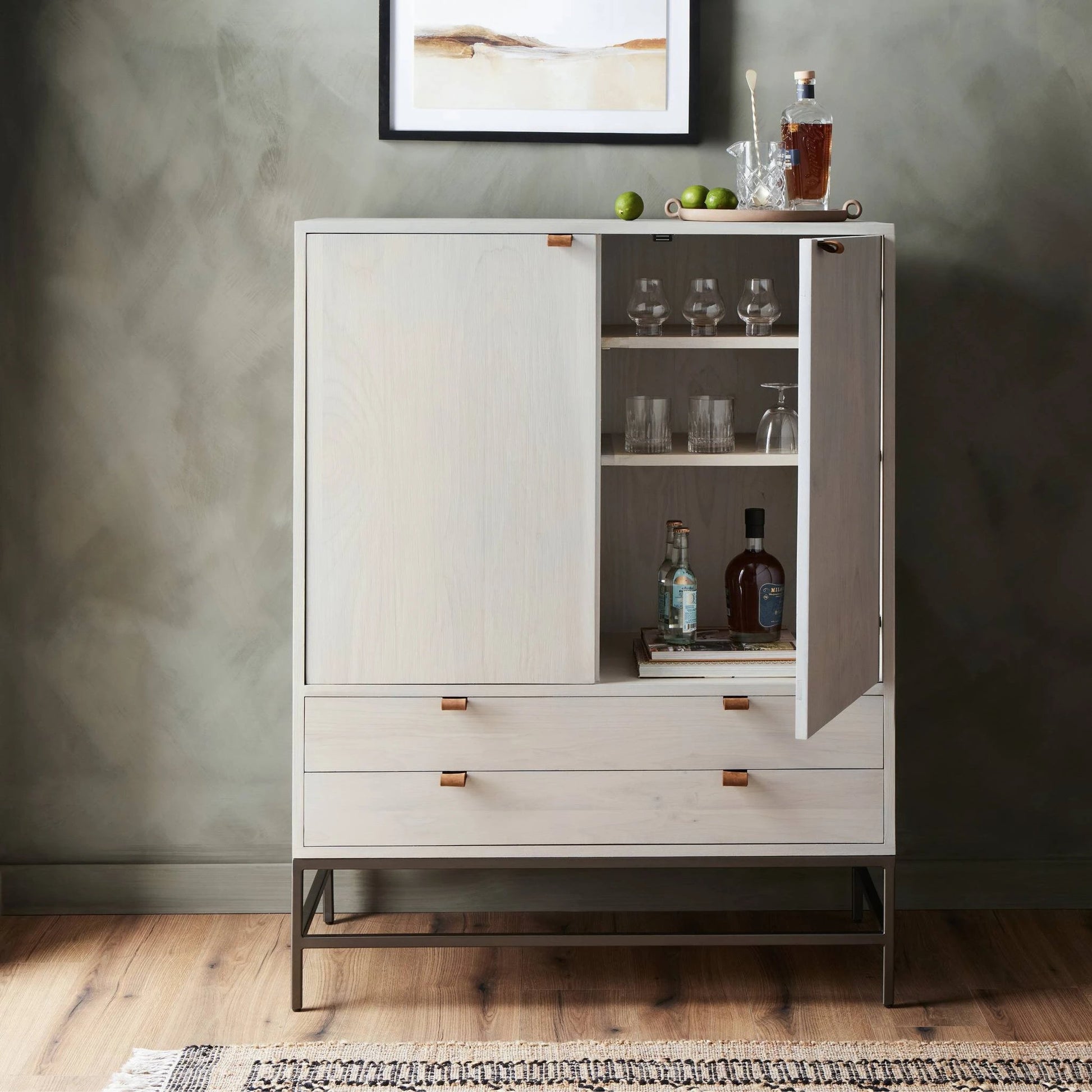 Trey Bar Cabinet by Four Hands in black wash poplar, toffee leather. Made from solid poplar, top grain leather in a modern style.