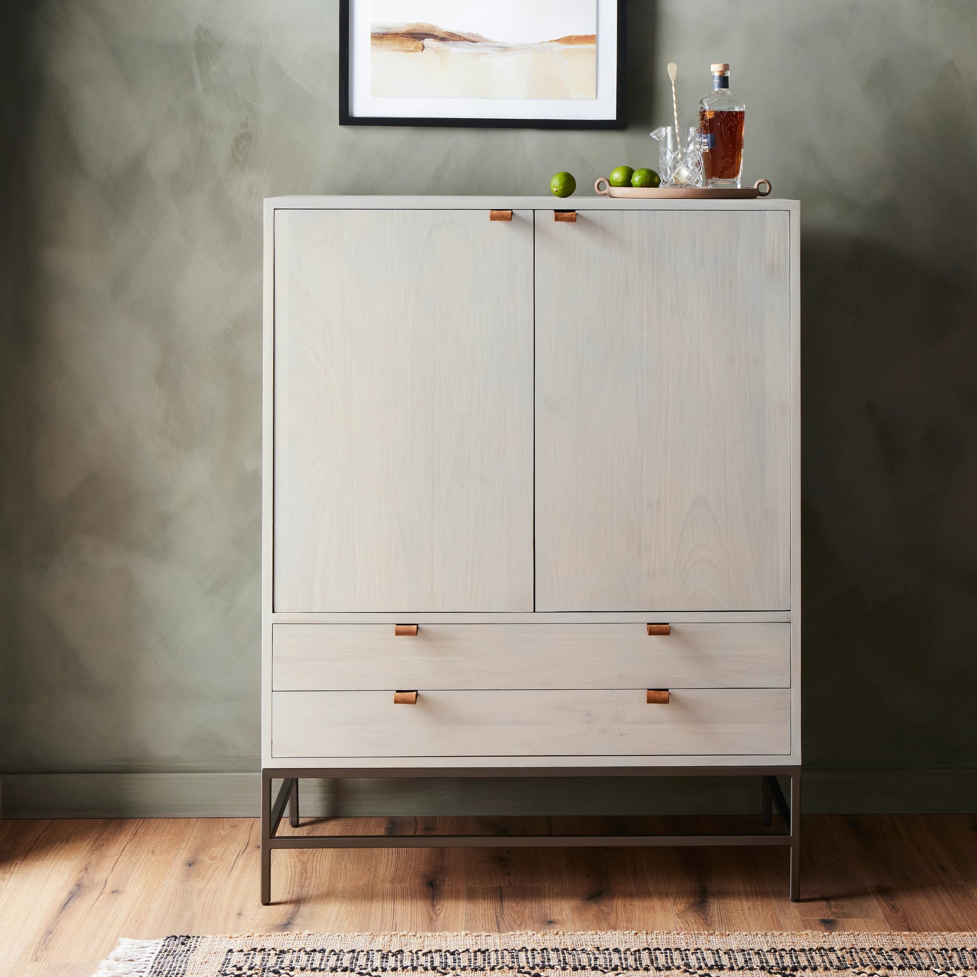 Trey Bar Cabinet by Four Hands in black wash poplar, toffee leather. Made from solid poplar, top grain leather in a modern style.