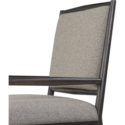Glenview Dining Armchair by Four Hands in weslie feather, smoked black oak. Made from 100% recycled olefin, solid oak in a transitional style.