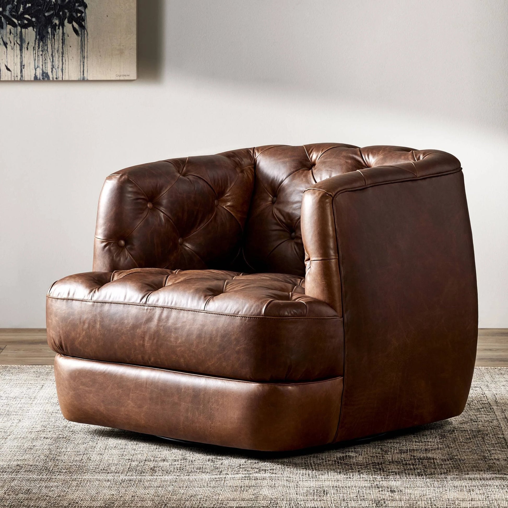 Paul Swivel Chair by Four Hands in raleigh cigar. Made from top grain leather, poplar plywood, 100% polyester in a modern style.