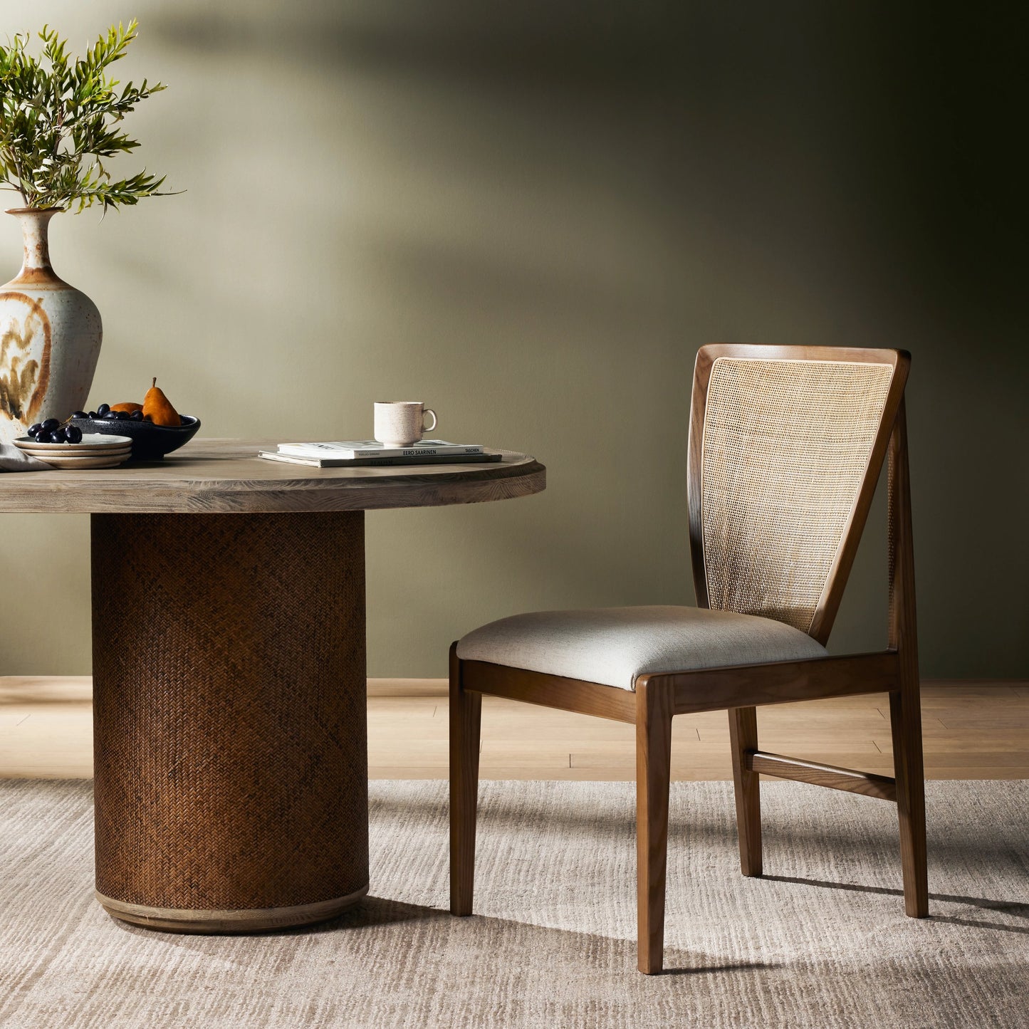 005 SI-2000920 | Lifestyle | Alida Dining Chair by Four Hands in alcala cream, warm ash. Made from 70% polyester, 20% viscose (rayon), 10% flax, linen, solid ash, cane in a transitional style.