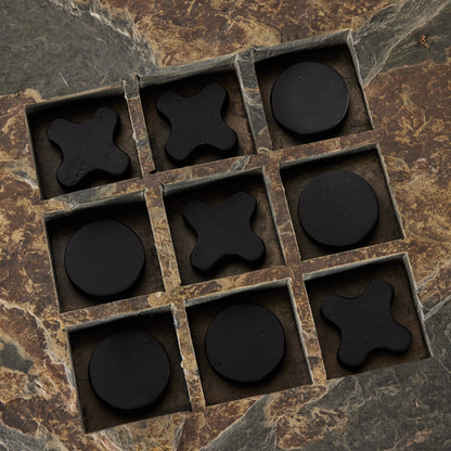 Stone Tic Tac Toe by Four Hands in grey stone, aged metal, carbonized black. Made from slate flagstone solid, solid mixed reclaimed wood, iron in a rustic style.