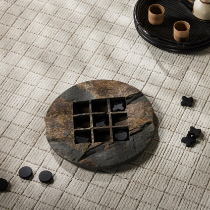 Stone Tic Tac Toe by Four Hands in grey stone, aged metal, carbonized black. Made from slate flagstone solid, solid mixed reclaimed wood, iron in a rustic style.