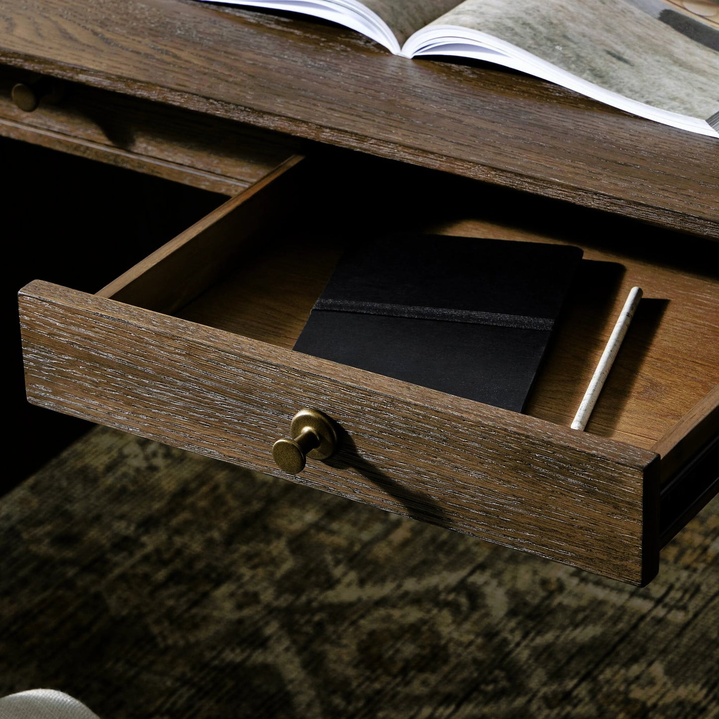 008 SI-2158294 | Closeup | Markia Executive Desk by Four Hands in aged oak veneer, rubbed bronze and aged oak veneer. Made from oak veneer, solid oak, iron in a modern style.