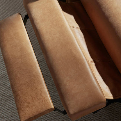 Rudd Recliner by Four Hands in palermo cognac and almond. Made from top grain leather, solid parawood, solid poplar in a modern style.