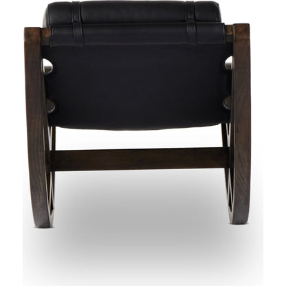 Tarelton Chaise by Four Hands in carson black. Made from top grain leather, solid nettlewood, 90% polyurethane foam pad, 10% polyester fiber batting in a modern style.