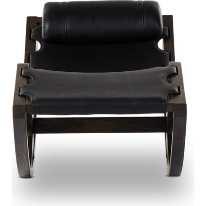 Tarelton Chaise by Four Hands in carson black. Made from top grain leather, solid nettlewood, 90% polyurethane foam pad, 10% polyester fiber batting in a modern style.