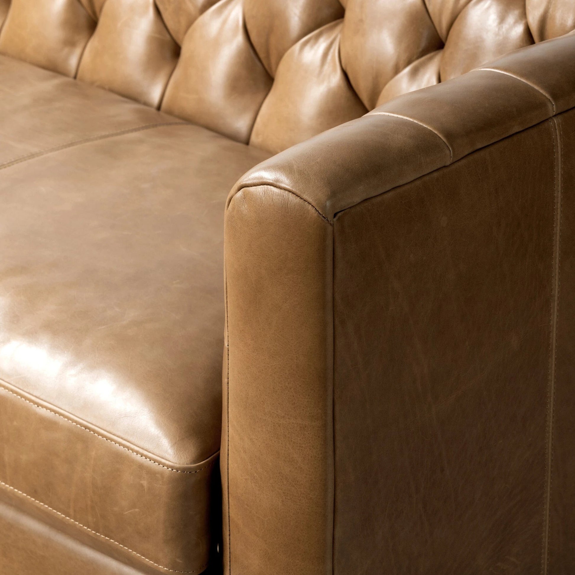 Thurston Sofa by Four Hands in dakota warm taupe and almond. Made from top grain leather, solid parawood, solid poplar in a modern style.